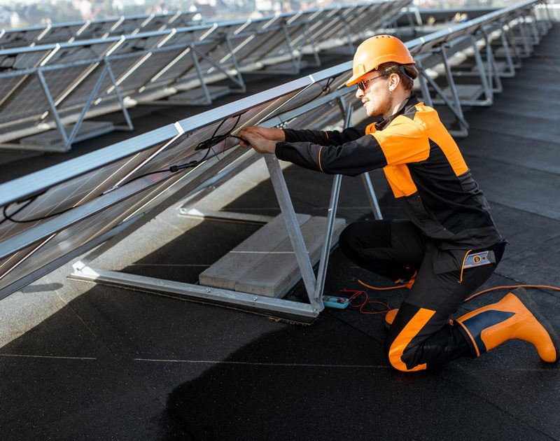 electrician-connecting-solar-panels-2021-09-02-01-01-24-utc